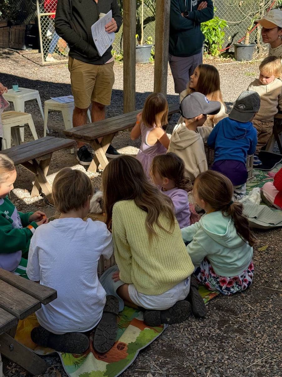Junior Rangers gathered on the picnic rugs for a ranger talk before heading out