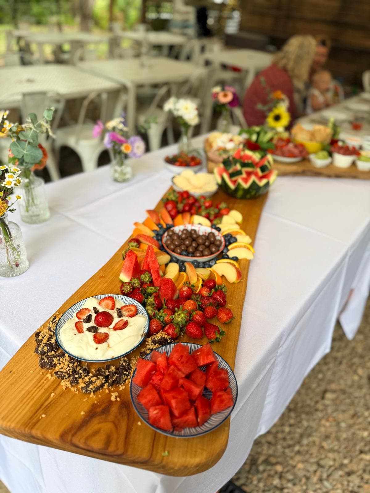 Fresh fruit platters for a baby shower in the gardens at Fairhill